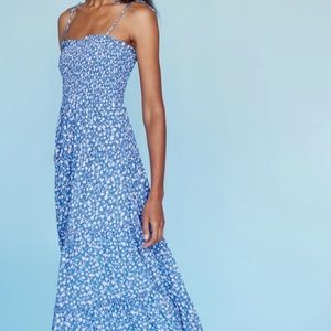 Like new- only worn once as seen in these photos. No stains :)